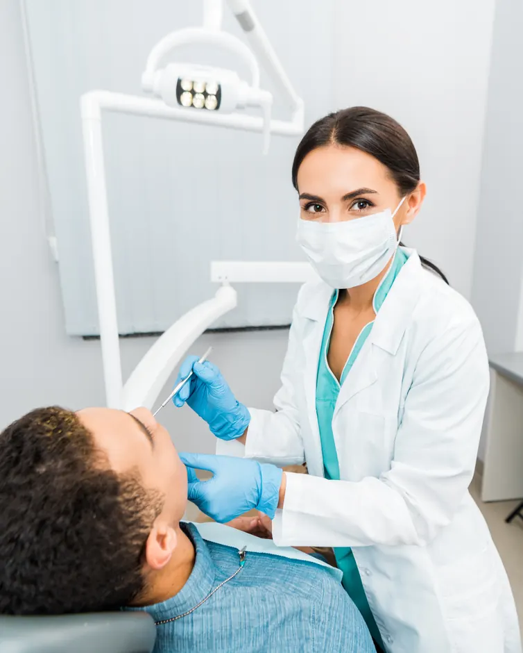Dentist examining a patient